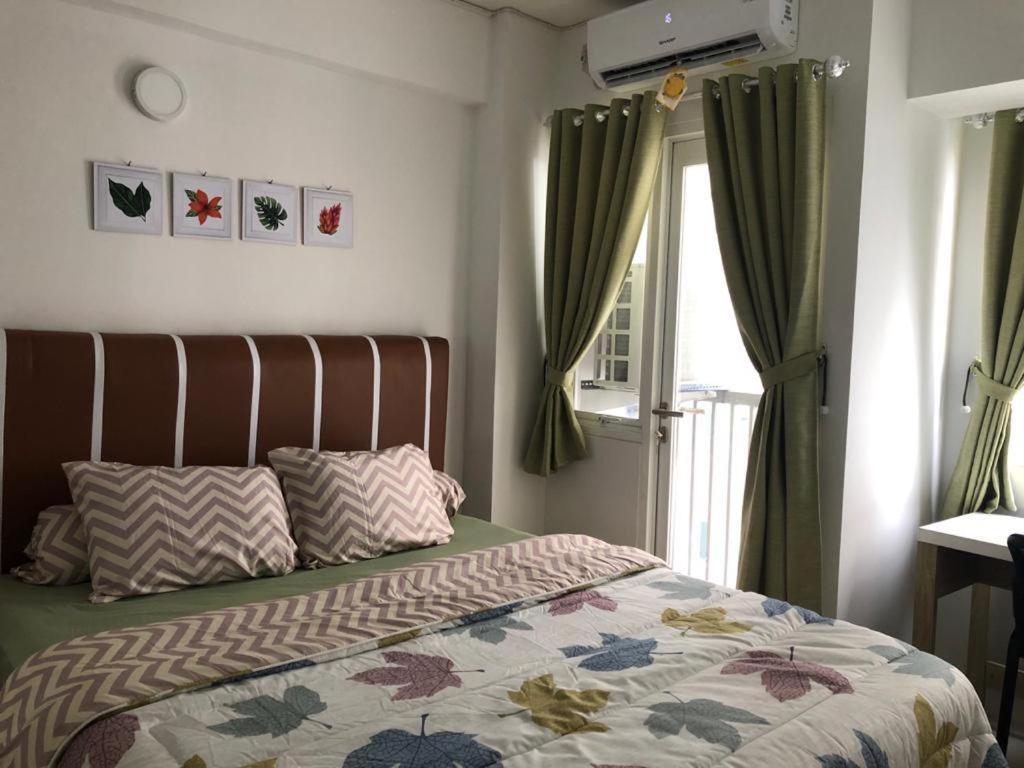 Apartment Grand Sentraland Karawang Manage By Laguna Room Exterior foto